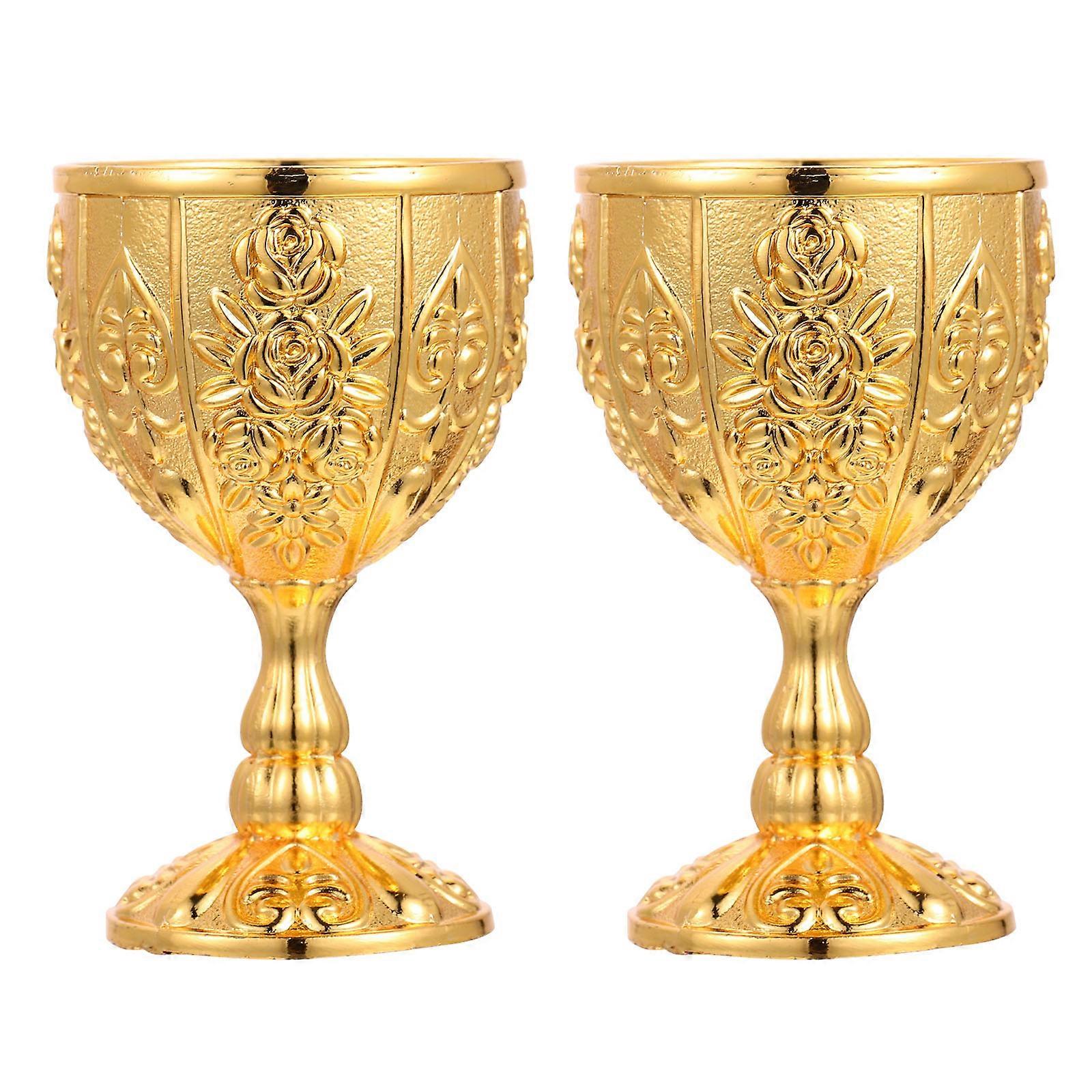 Here's a polished and professional product description based on your input:
**2pcs Vintage Style Metal Wine Cups – Elegant Embossed Goblets for