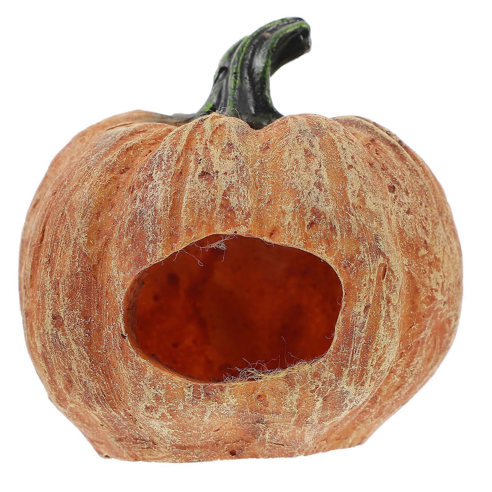 The **Creative Reptile Hideout Cave Pumpkin Shaped Shelter** is a fun and functional decorative item designed for reptile tanks and terrariums. It's