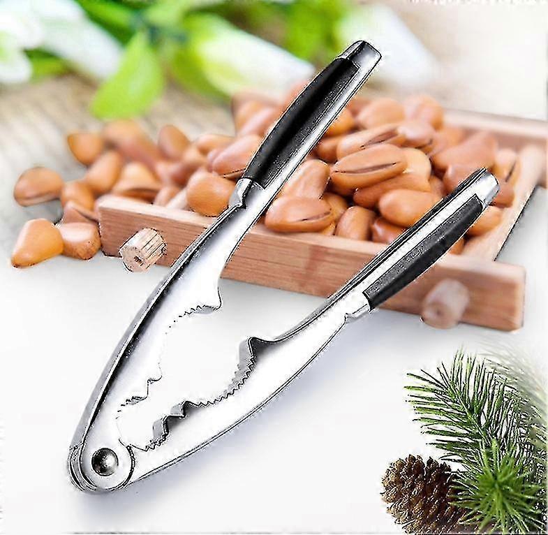 Nutcracker - Nutcracker, hazelnuts, and seafood tongs
