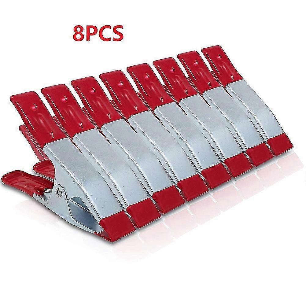 6-inch metal spring clips with soft plastic tips for holding photos and crafts. Hinged jaws for a better grip on uneven surfaces.