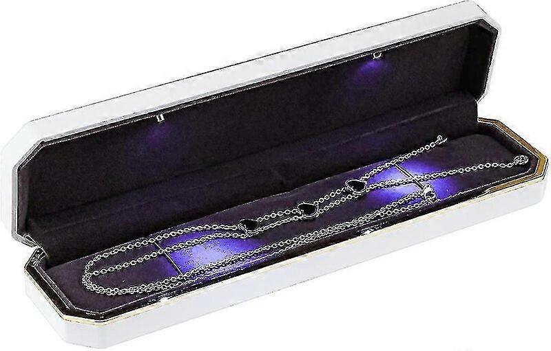 Ring box with LED lights, piano-polished appearance, creating a romantic atmosphere