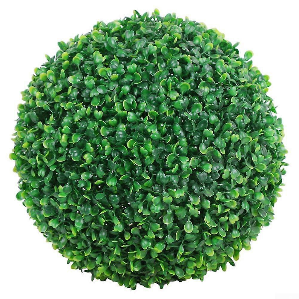 Durable plastic grass balls, for enhancing visual appeal in gardens and environments.
