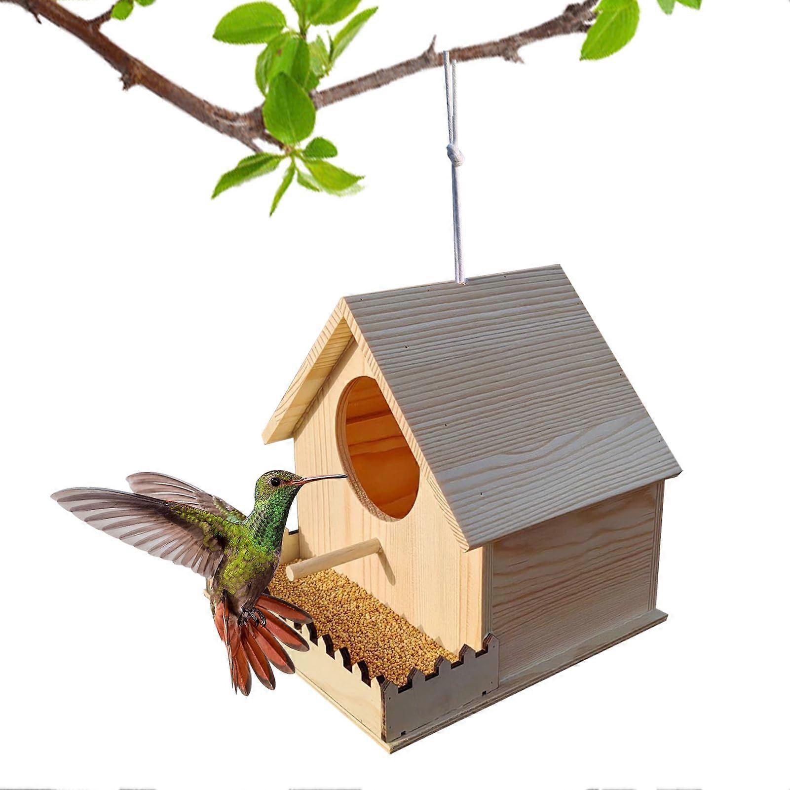 Wooden birdhouses with aviary, perch, feeder, nesting site, hummingbird, garden