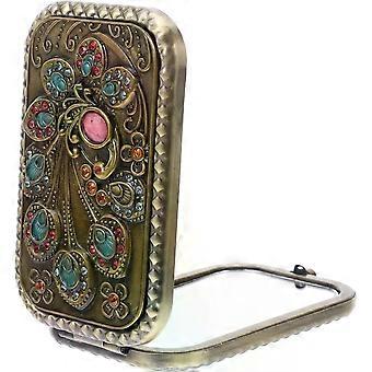 Espelho compacto dobrável de metal e vidro, com design elegante europeu, ideal para viagens e uso diário. Possui duas faces e é perfeito para mulheres e meninas. Ideal para levar na bolsa de maquiagem.