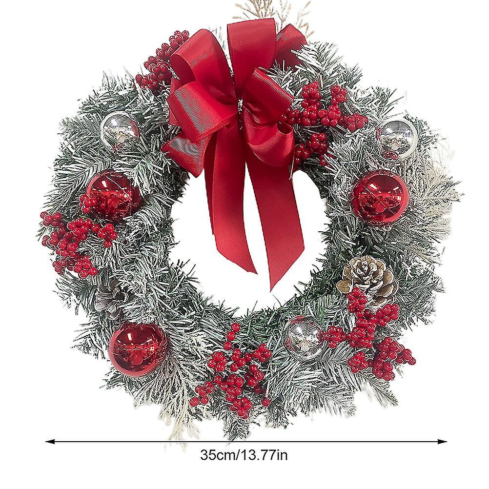 正面玄関の寝室のリビングルームの暖炉のためのクリスマスリースの装飾