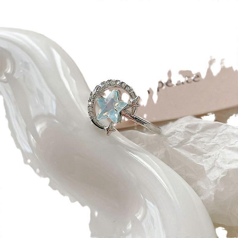 Blå stjärnring, damaccessoarer, elegant mode, mångsidig svansring