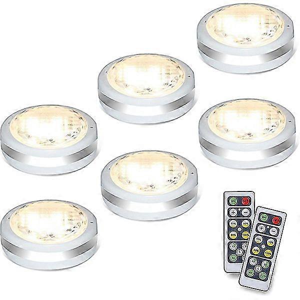 Puck lights with Lmell remote control. Battery-powered under cabinet lighting. Wireless LED