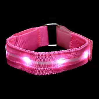 Pulseira luminosa LED rosa para uso externo com alça ajustável.