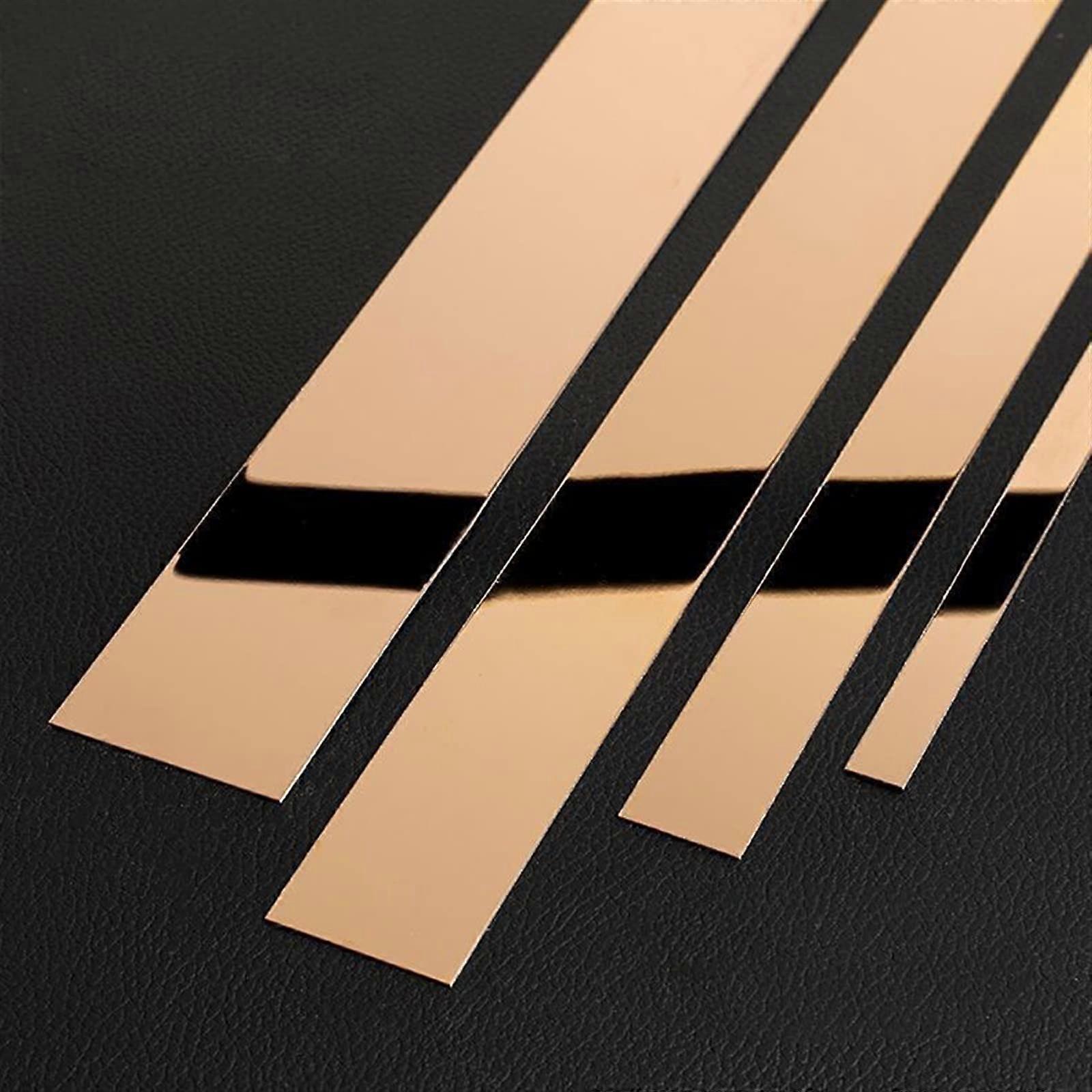 Rose gold mirror, width 18cm