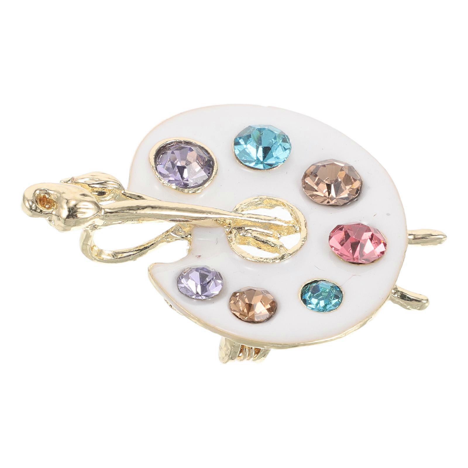 Here's a polished and engaging product description based on your input:

 

**Elegant Rhinestone Alloy Paint Palette Brooch Pin for Women –