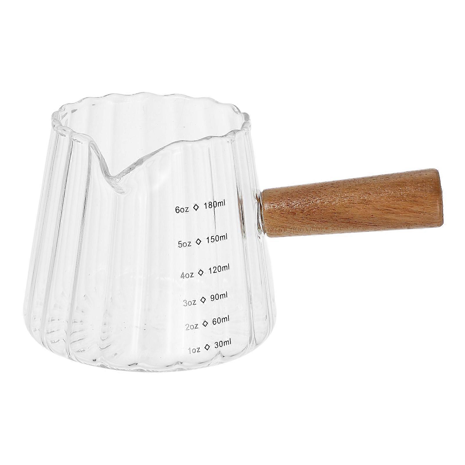 Here's a polished and professional product description based on the details you provided:
**Transparent Glass Milk Frothing Pitcher with Wooden