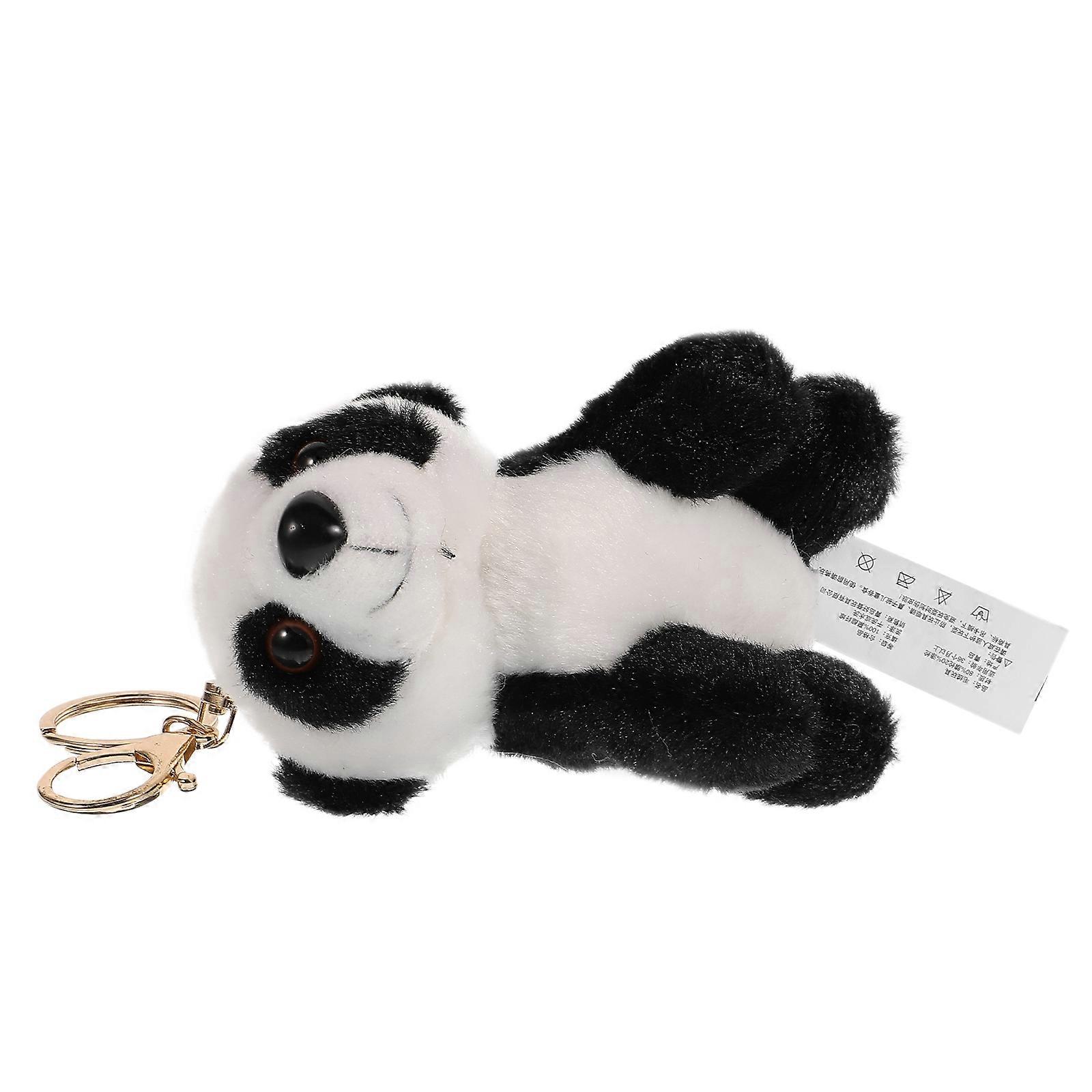 The **Soft Plush Panda Keychain with Ring** is a charming and versatile accessory that combines cuteness with functionality. Here's a breakdown of
