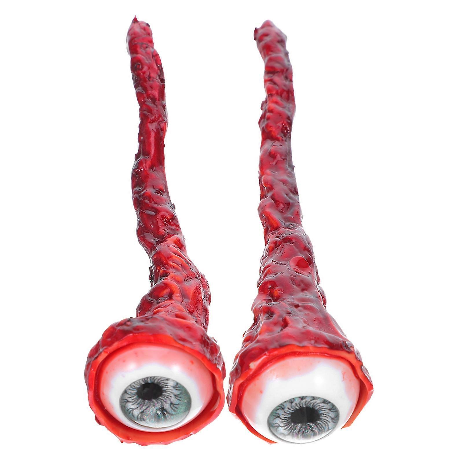a polished and engaging product description based on your input:
**2pcs Ripped Eyeball Props Realistic Latex Halloween Decorations**
Add a
