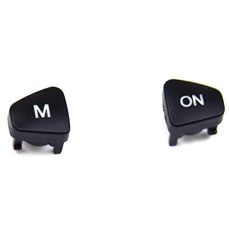 The Cruise Control Switch and the M ON Button for the Car Audio and a Volume Steering Wheel Button for a 2013-2015 Fiesta.