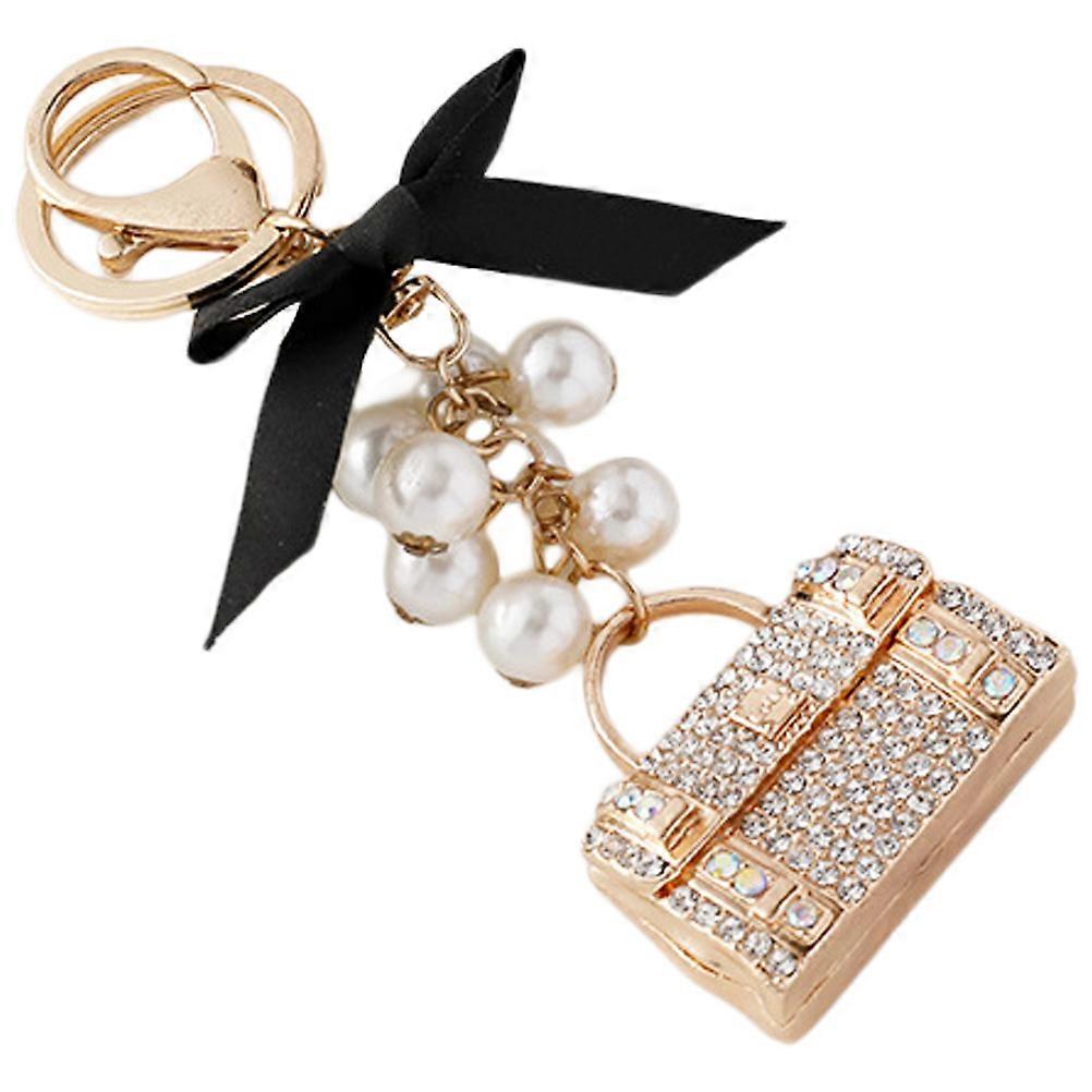 金色の合金素材と優れた職人技を備えた女性用キビキラキーホルダー 3.5インチ