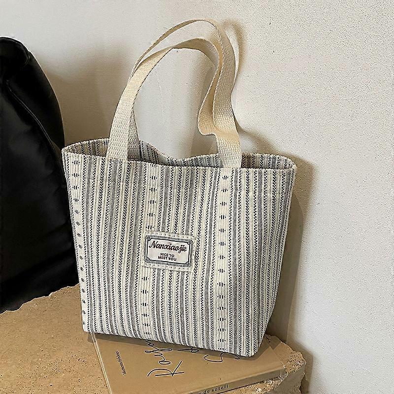 Women's canvas bag, 2024 Korean style casual striped tote bag, large capacity, suitable for class or commuting, shoulder bag.