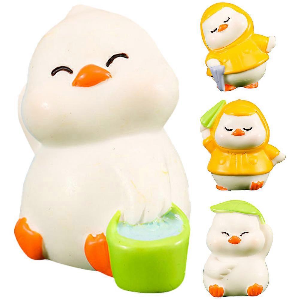 a refined and engaging product description based on your input:

 

**4pcs Miniature Duck Ornaments – Cute Tiny Animal Models for Tabletop Decor,