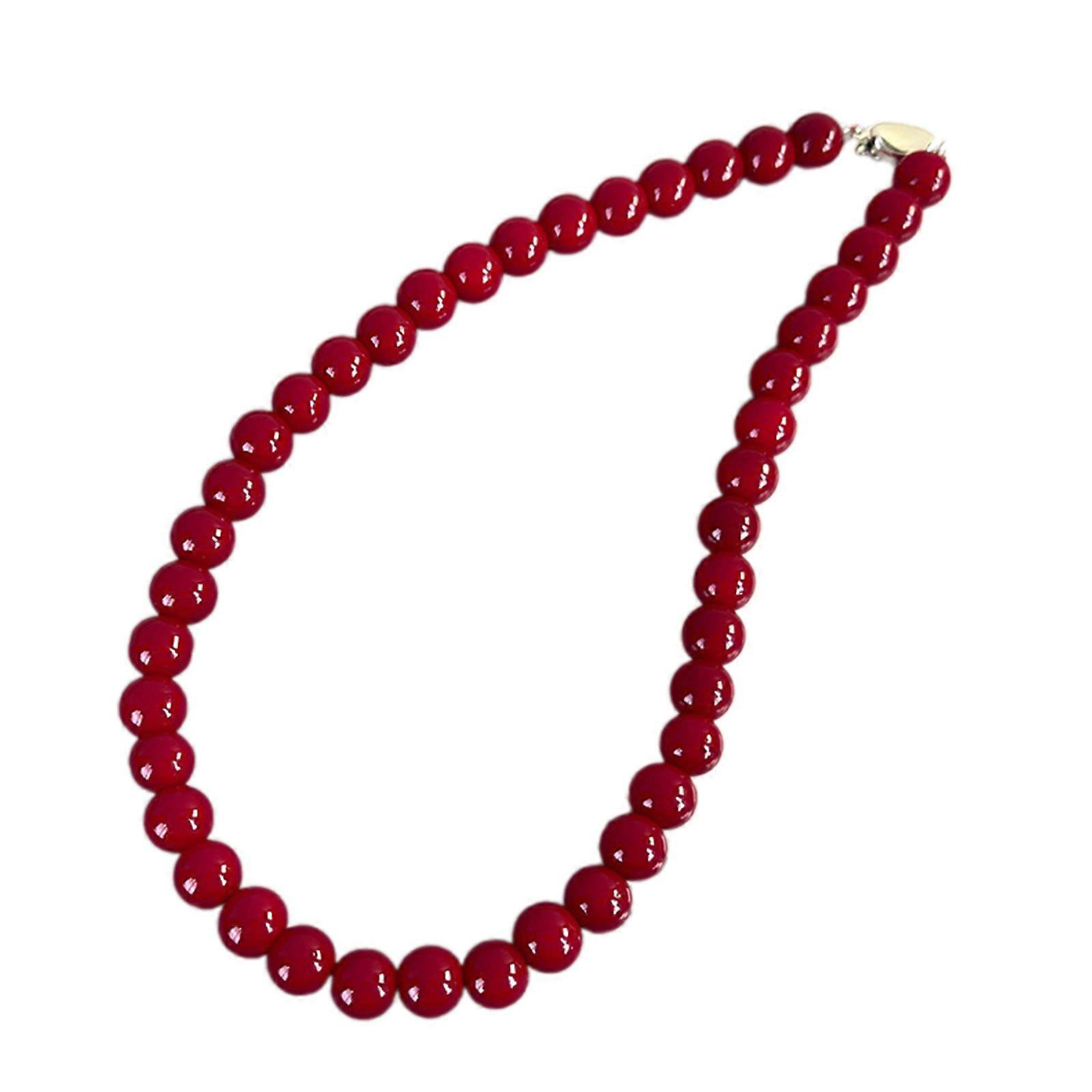 Collier de perles confortable et élégant, orné de perles rondes multicolores et à longueur ajustable.