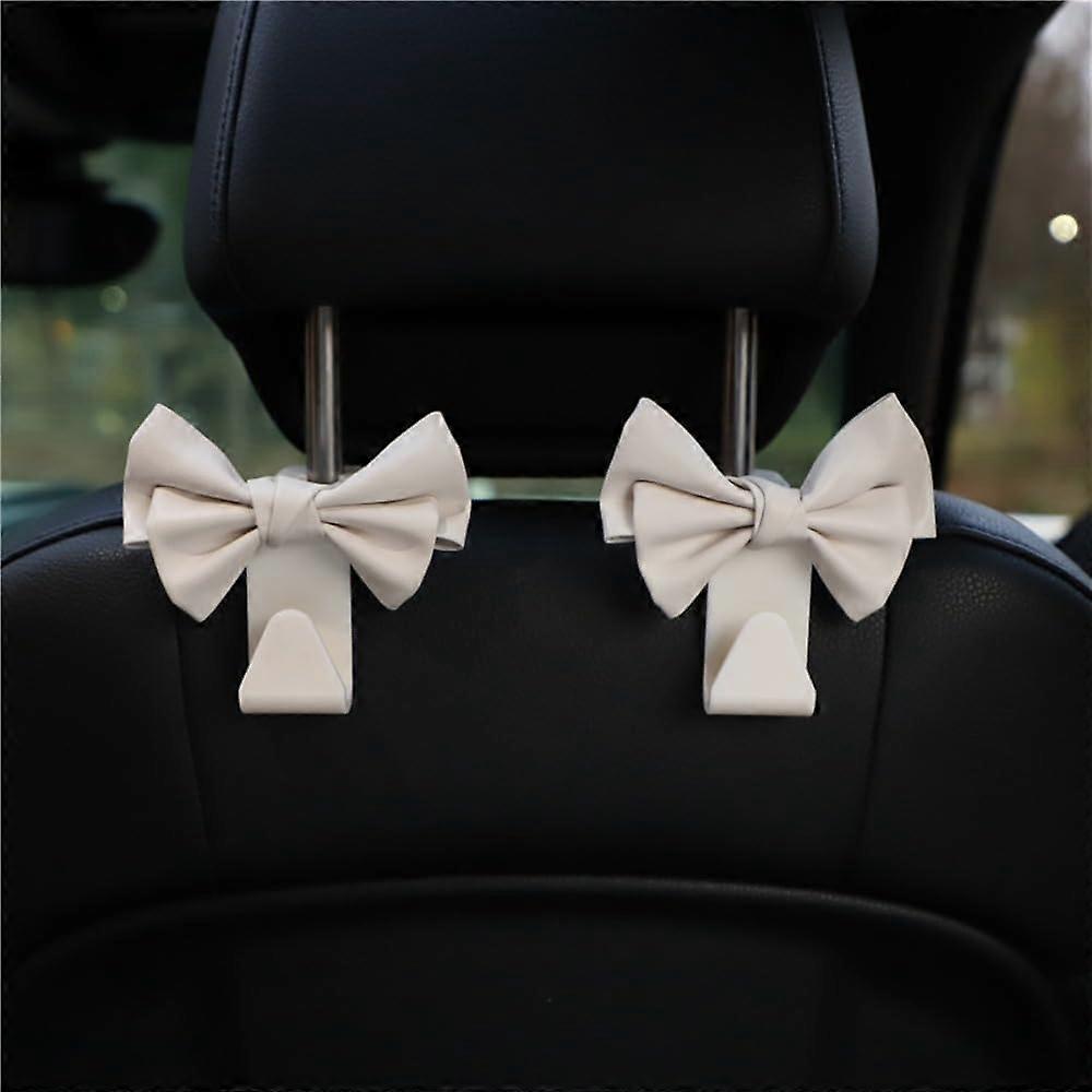 2 Pack Car Headrest Hooks with Cute Bow, SpaceSaving Organizer for Purses, Bags, Handbags – White