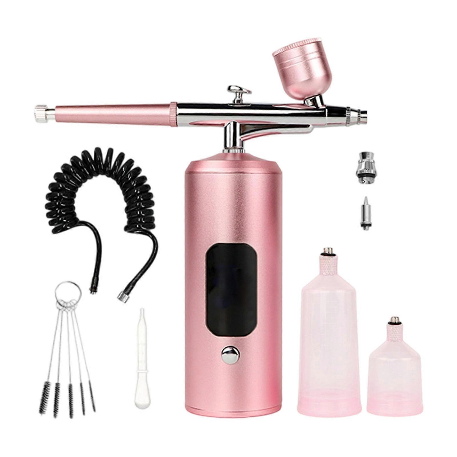 Advanced High Efficiency 7.4V Handheld Air Sprayer Tool Multi Use Design For Deep Moisturizing Cosmetic Detailed Artwork pink color