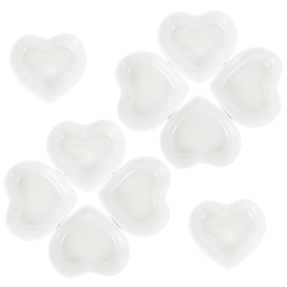 Great! Here's a polished and professional product description based on your input:
**10pcs Heart Shaped Mini Dipping Bowls – Lightweight Ceramic