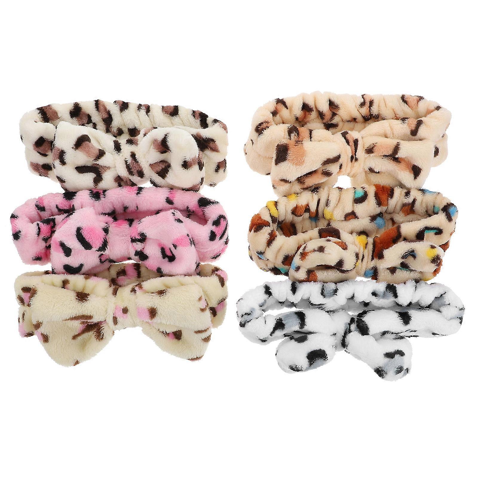 Here's a refined and professional product description based on your input:
**6 Pack Wide Elastic Cloth Headbands with Leopard Print Bowknot