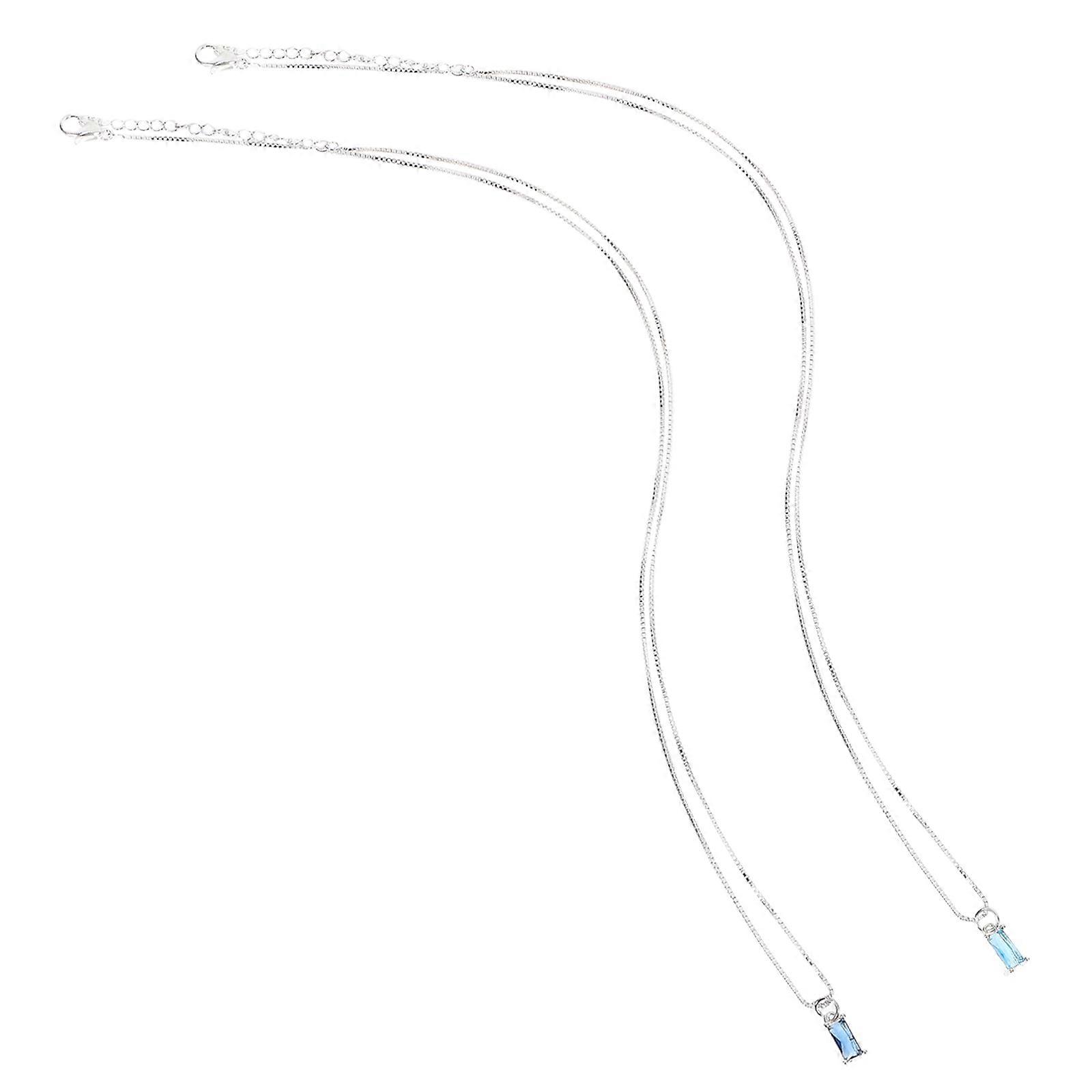 a refined and professional product description based on your input:

 

**2pcs Women's Cube Pendant Necklaces – Lightweight & Stylish Square Stone