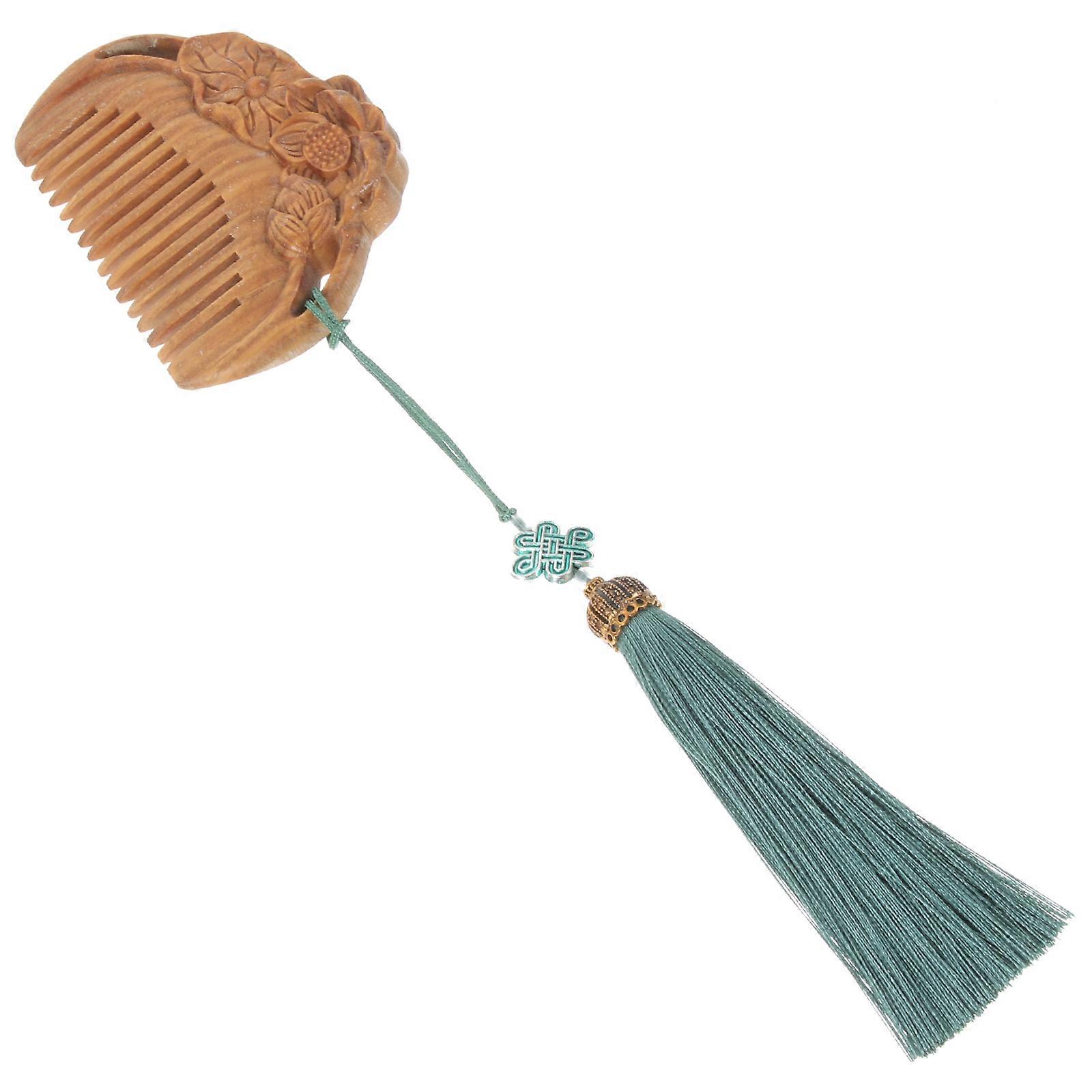 The **Natural Wooden Sandalwood Comb with Carved Lotus Design** is a beautifully crafted hair accessory designed for women, combining functionality