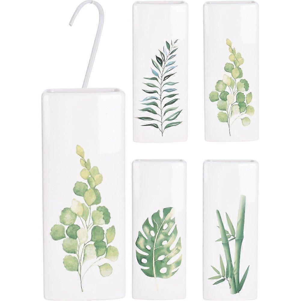 Ceramic humidifier with leaf motif for dry winter days