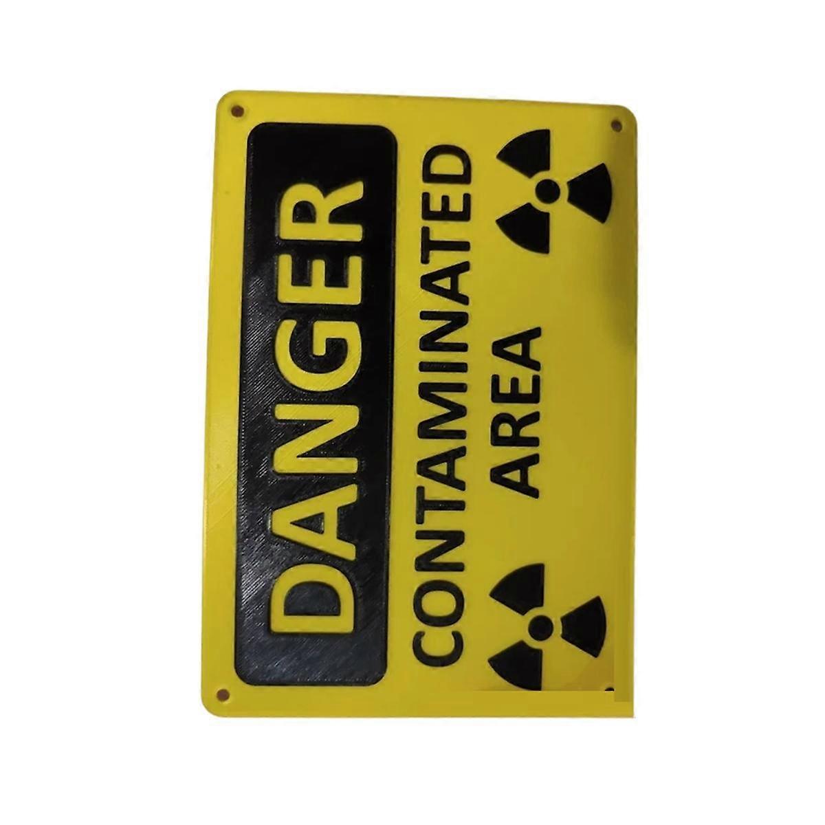 Warnschild „Gefahr durch radioaktive Strahlung in kontaminierten Bereichen“