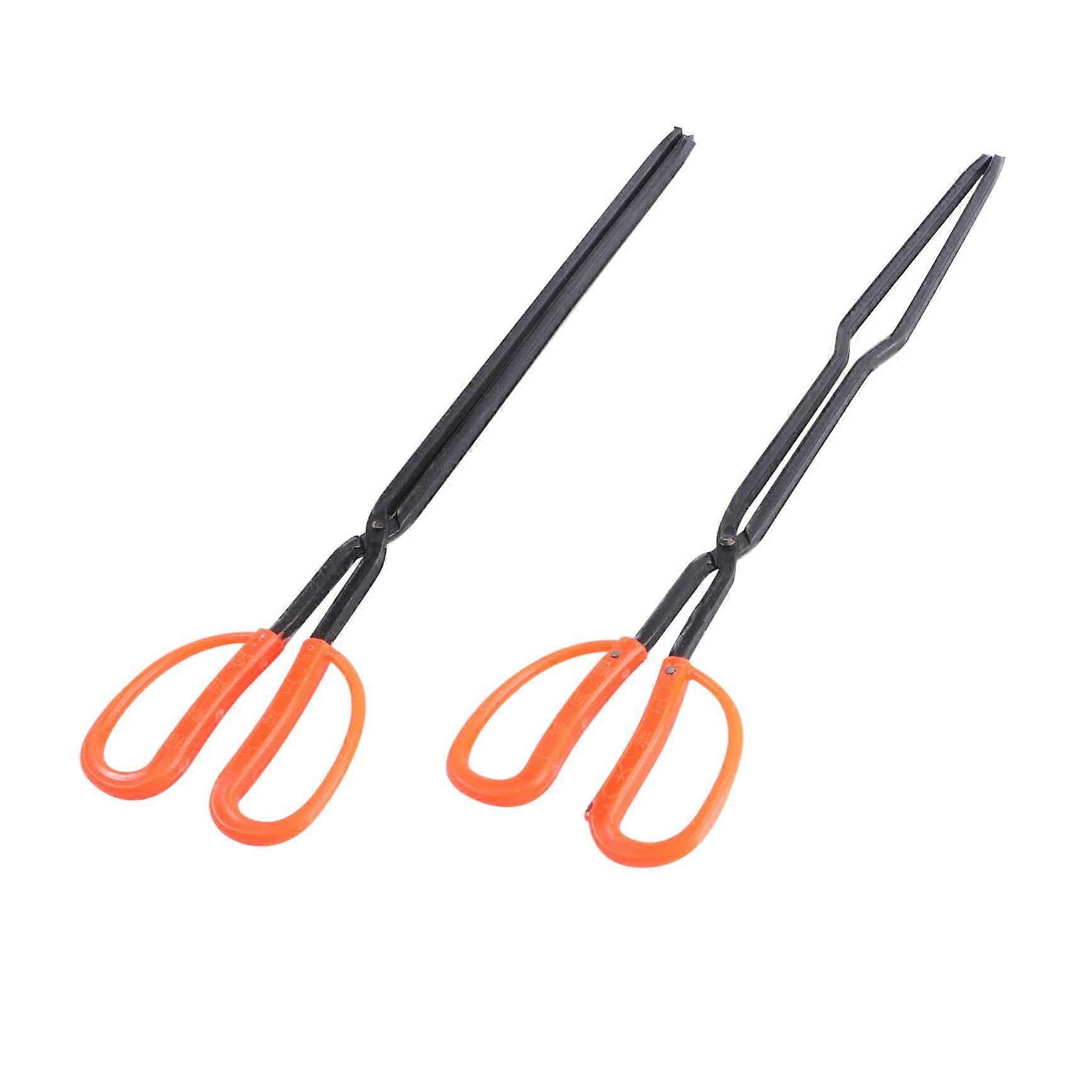 2 pieces of briquette tongs with heat resistance for grilling, fireplaces, and events. Practical grippers for cleaning.