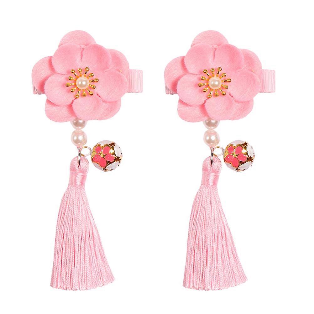 It looks like your message got cut off, but with the **Flower Hair Clamp For Cute Tassel Hair Grip With Bells**!
This type of hairpin is a stylish