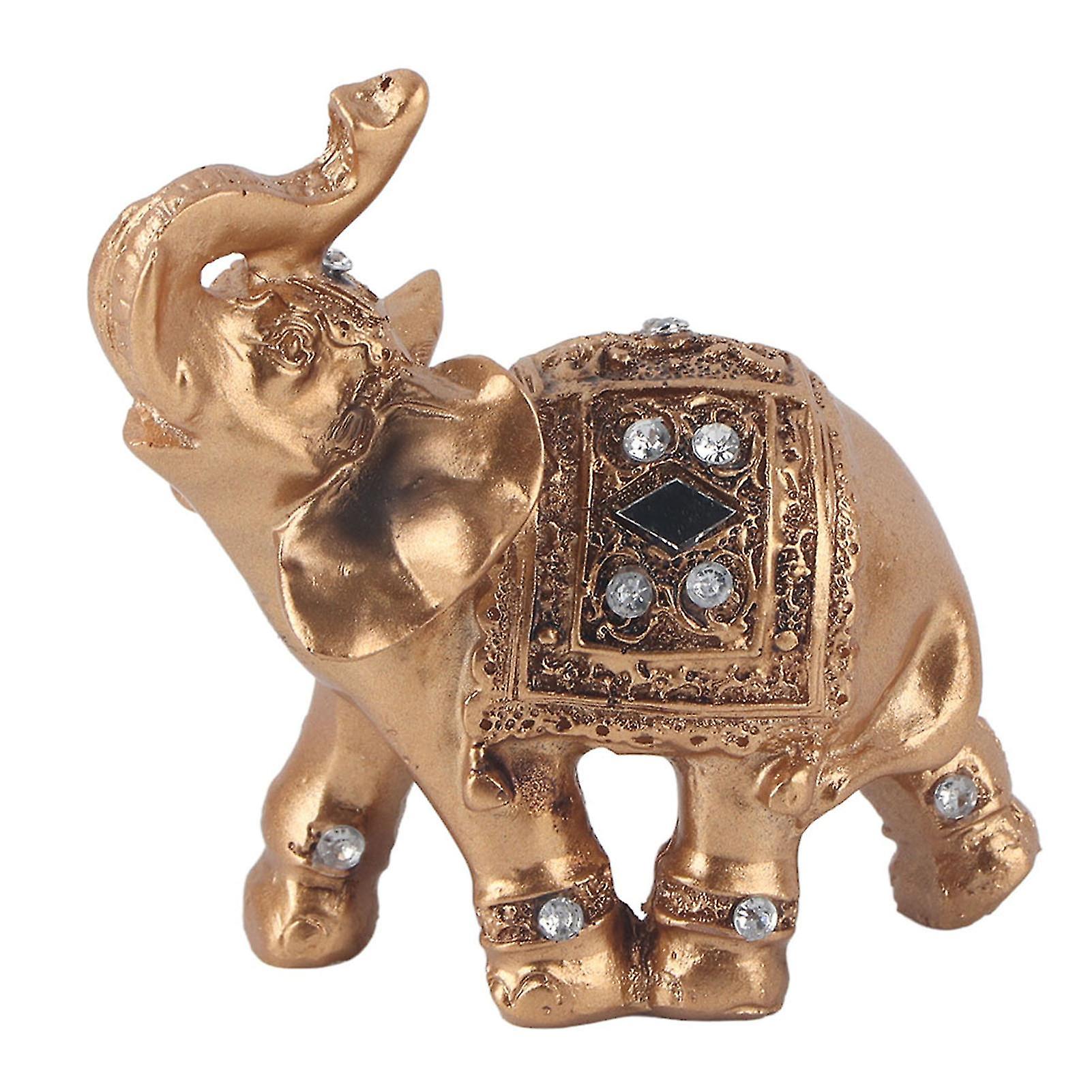 Elegant golden statuette with upward-facing trunk, collectible home decoration (9 x 9 cm)