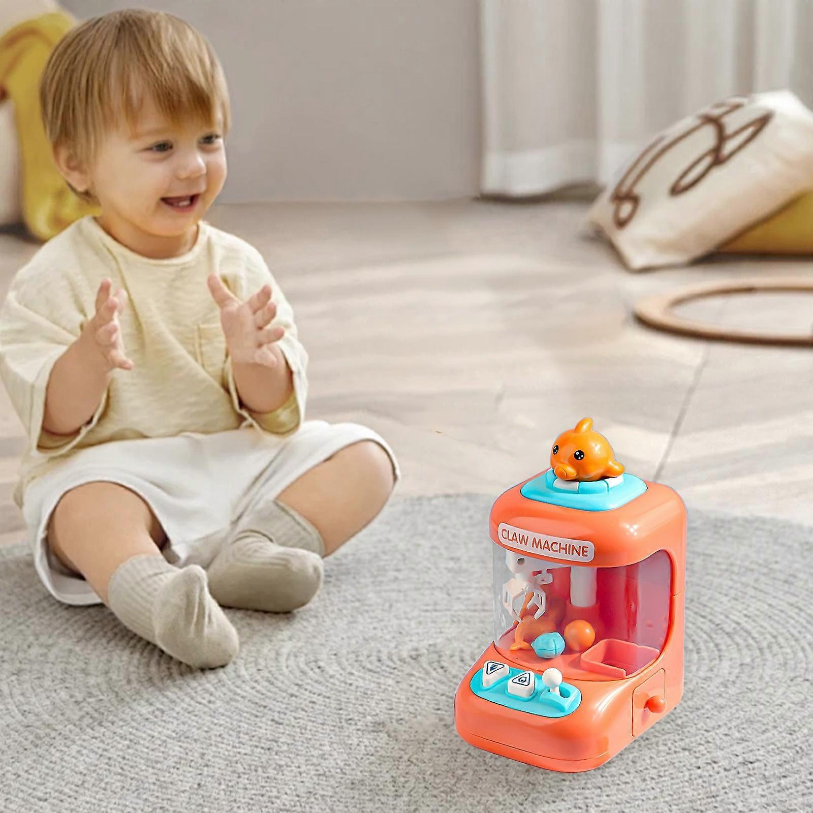 Portable Mini Claw Machine Toy For Kids With Interactive Design And Light Effects Encourages Hand Eye Coordination And Fine Motor Skills Development F