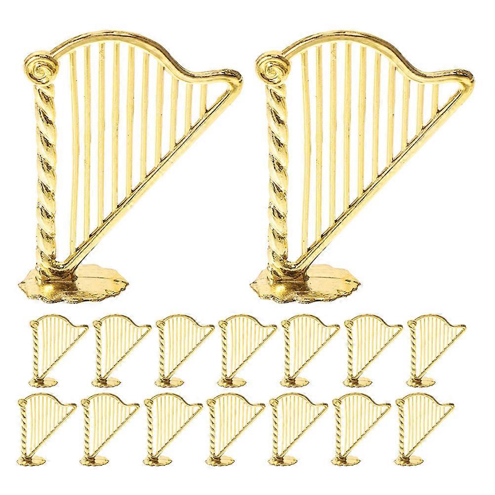 Here's a polished product description based on your input:

 

**30pcs Miniature Harp Ornament – Elegant Musical Instrument Decor for Christmas Tree