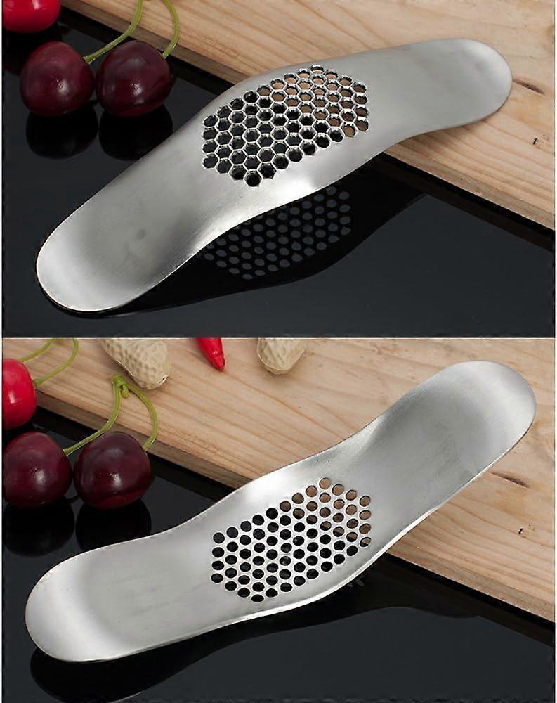 Garlic press Garlic rocker in metal construction, made of stainless ...