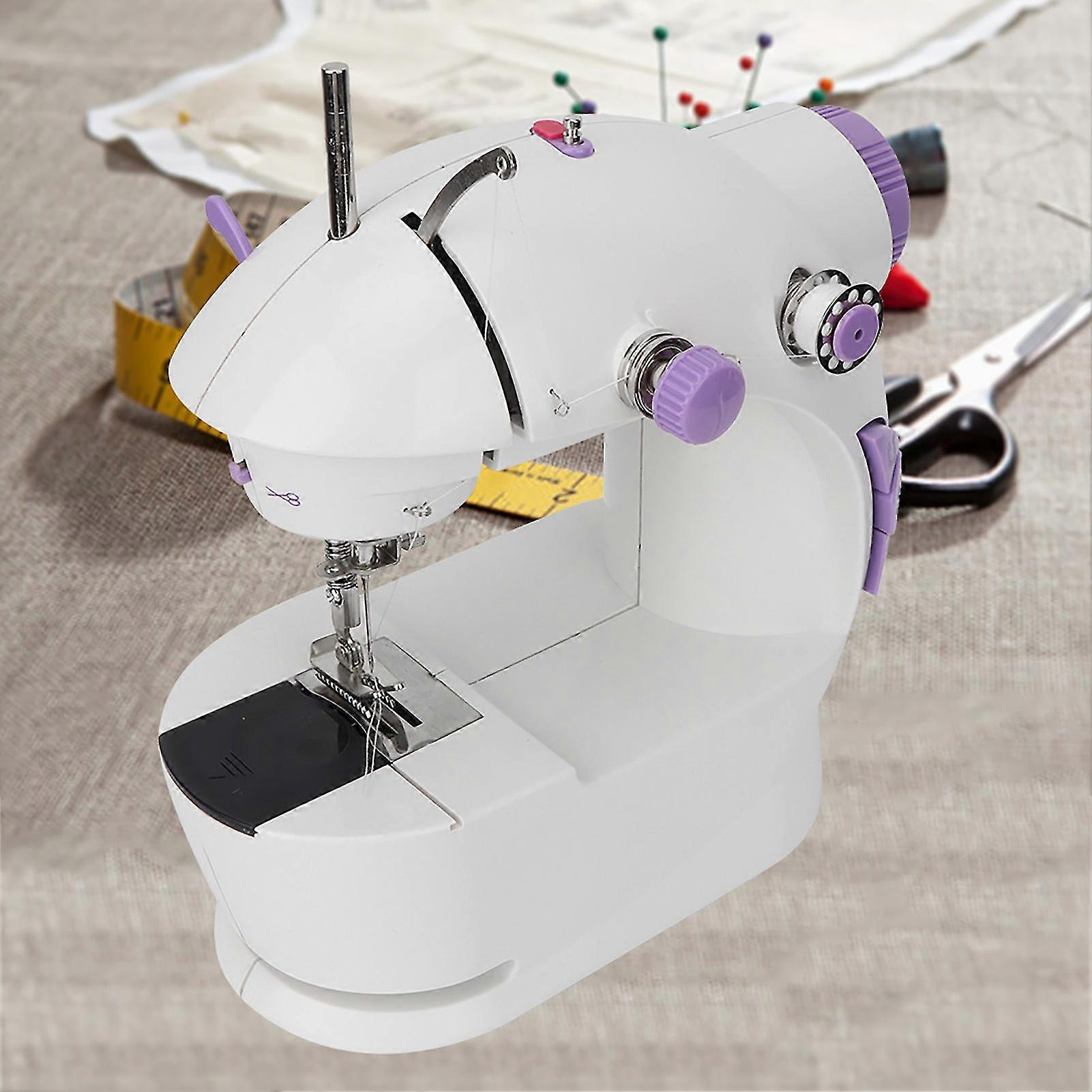 25-26 Mini Portable Household Electric Sewing Machine with Light, Compact