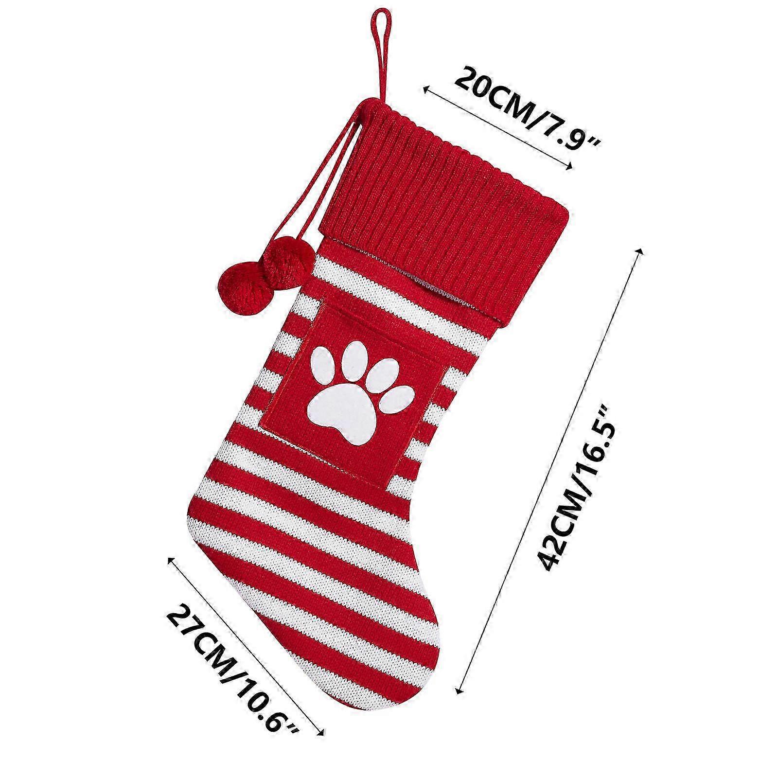 Christmas tree decorations with red striped stockings and large letters