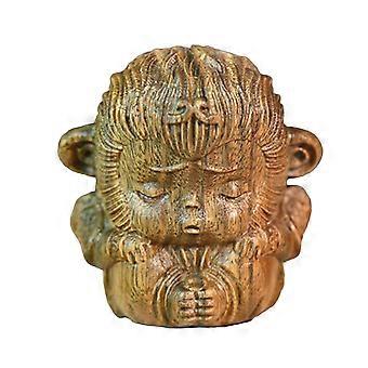 Porte-encens miniature en bois sculpté représentant un singe, idéal pour décorer un salon ou comme petit porte-encens.