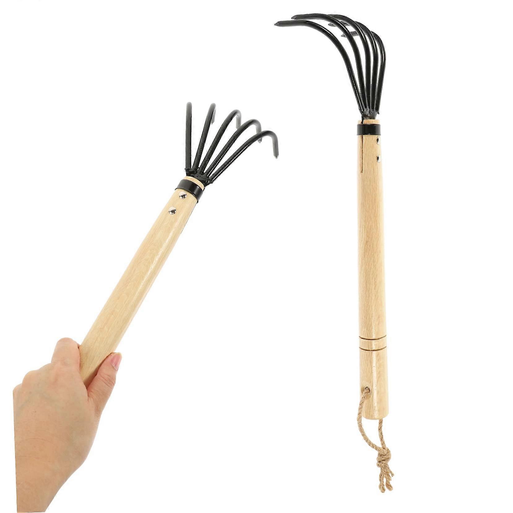 Hand shovel with sturdy garden tool for digging up clams on the beach to loosen soil for agricultural use.