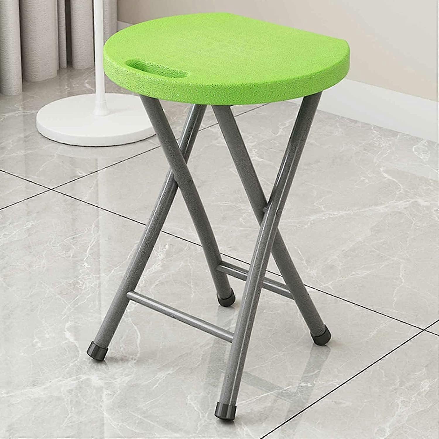 Portable folding stool, ultralight camping chair, 136 kg capacity, durable PP, easy carry, green.
