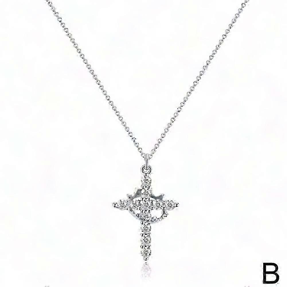 Diamond-Crowned Cross Pendant with Rotating Pavé Design
