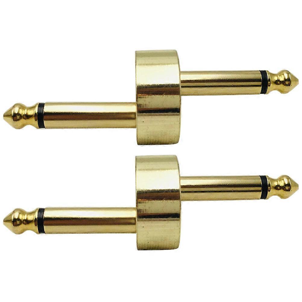 It sounds like you're referring to a product listing for **metal guitar effect pedal connectors** — specifically a **double head adapter** designed