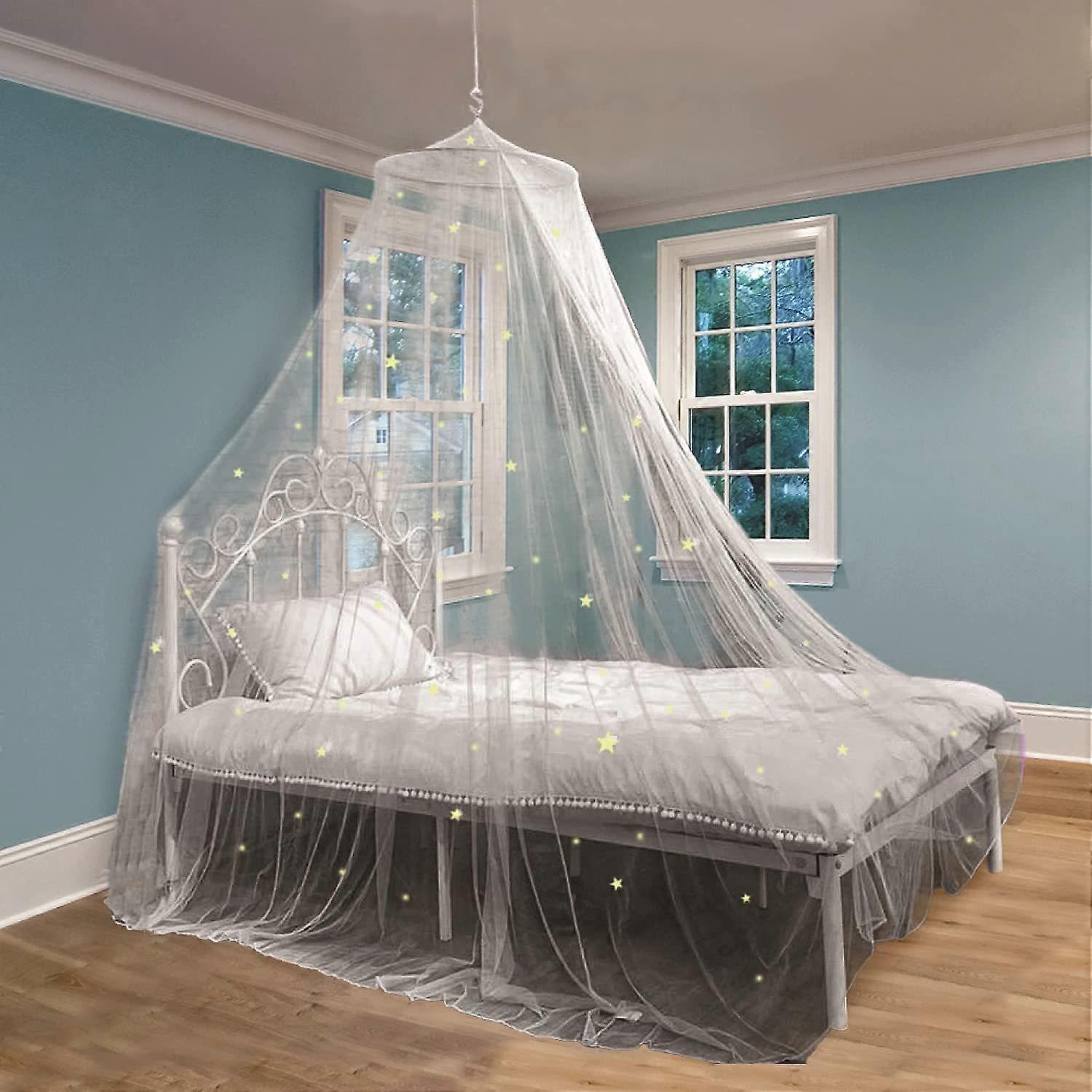 White glowing stars and dome mosquito nets