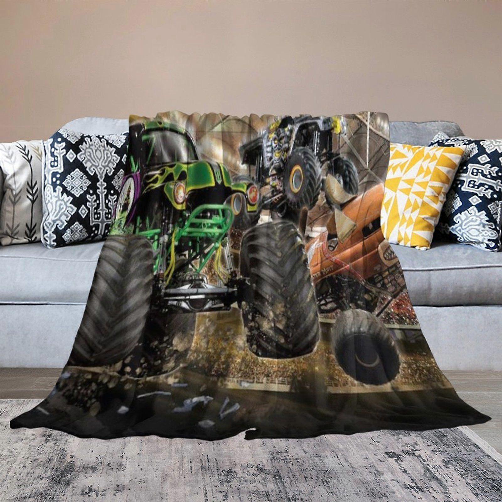 Manta leve de secagem rápida com estampa de caminhão monstro, ideal para viagens, inverno e uso doméstico. Não amassa, é portátil e aconchegante.