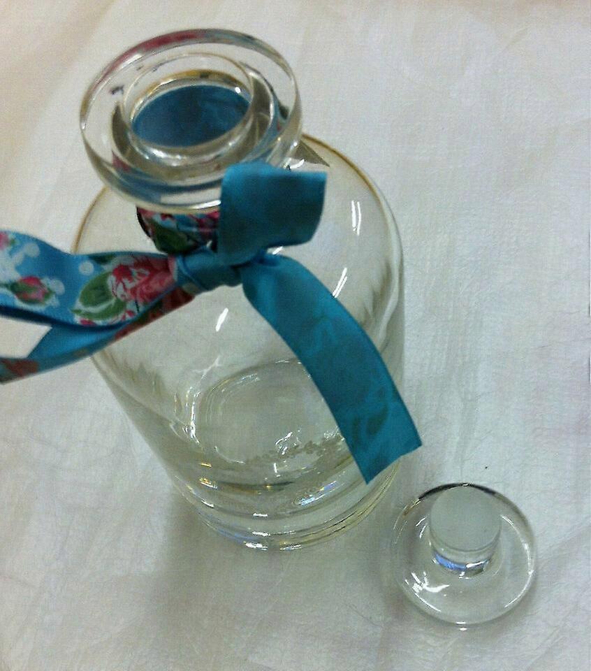 Apothecary Bottle with heart printed on it