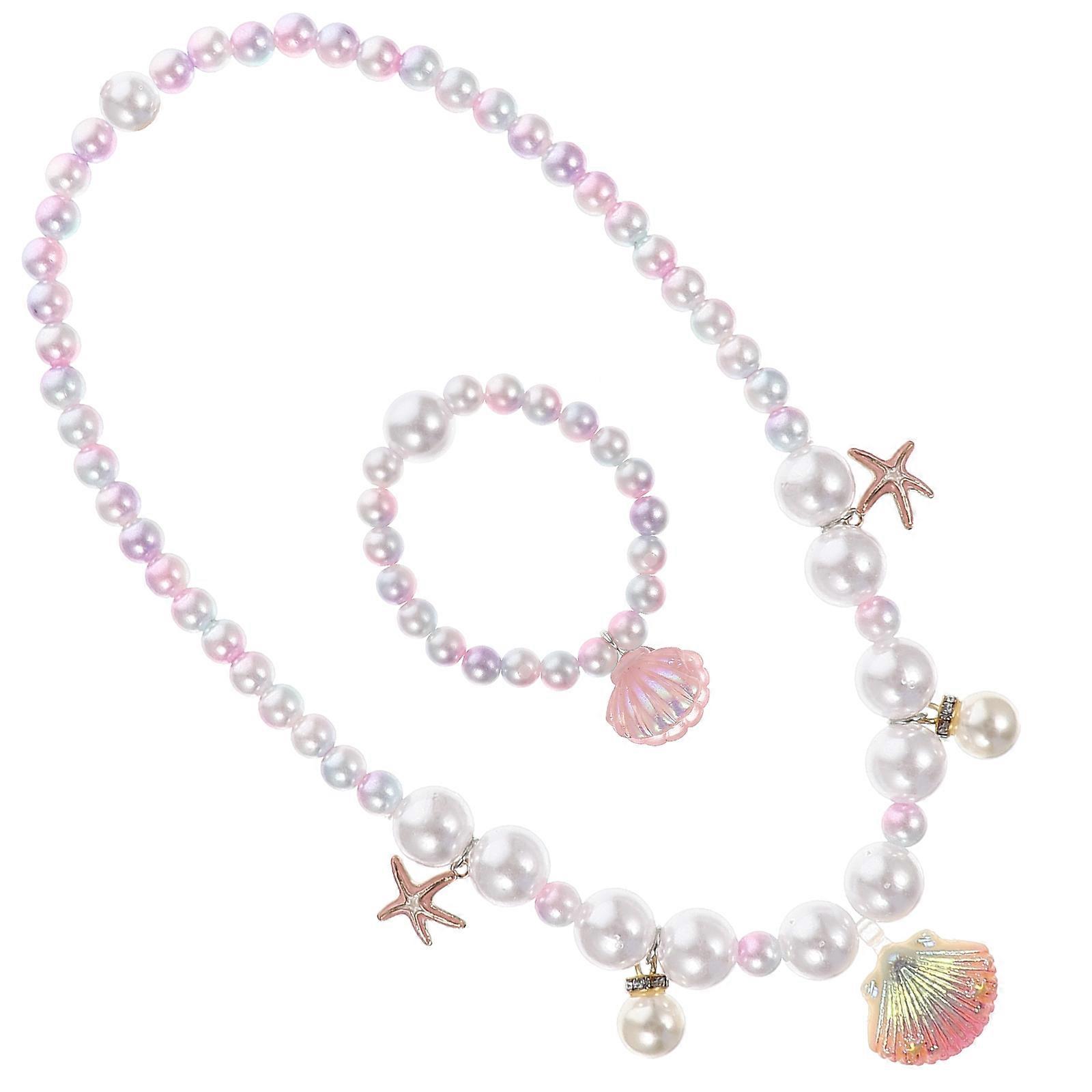 Here's a refined and attractive product description for your **Pearl Necklace and Shell Bracelet Set**:

 

### 🌊✨ Elegant Pearl Necklace & Shell