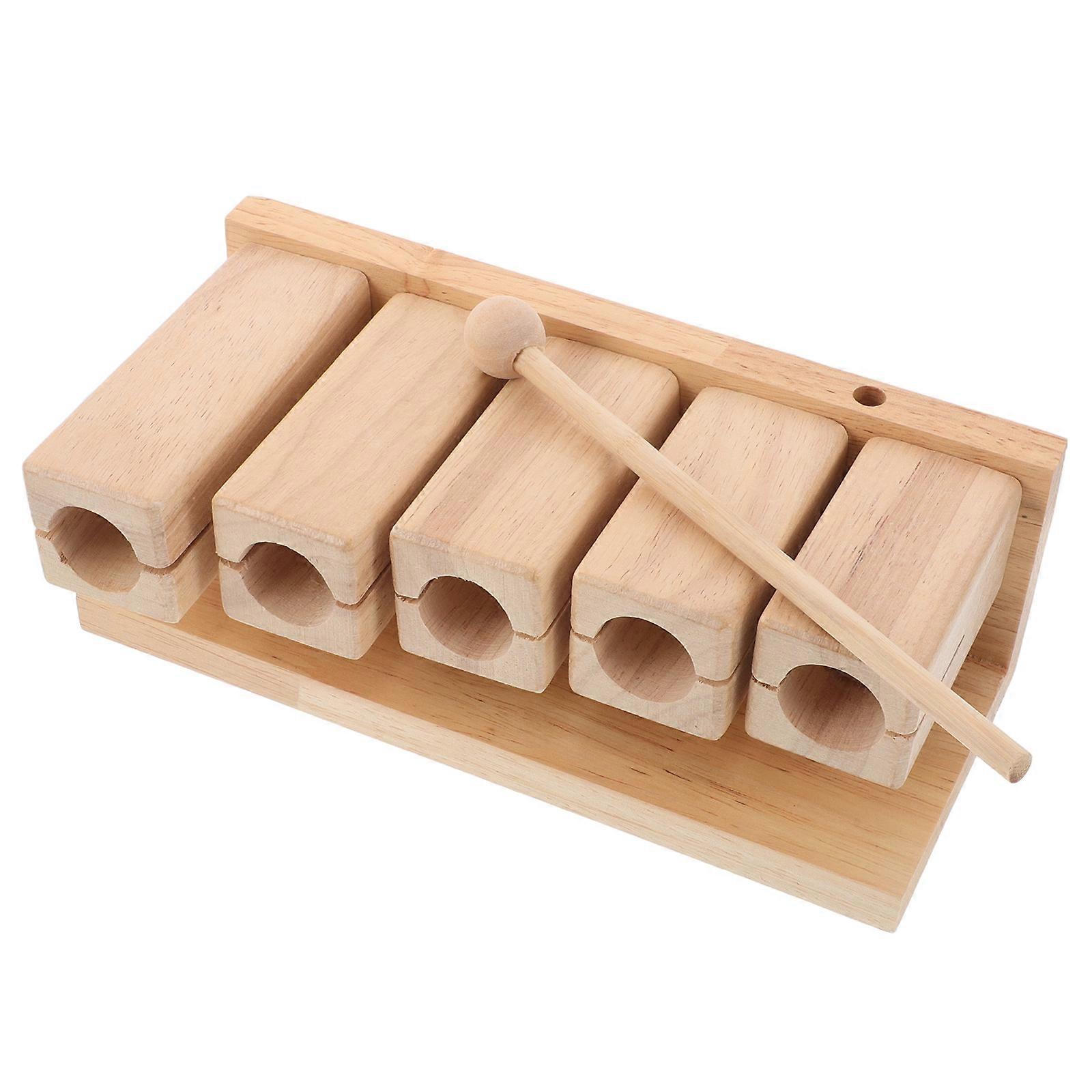 The **Wood Rhythm Block Musical Percussion Instrument Set** is a fun and versatile percussion instrument designed for a wide range of musical