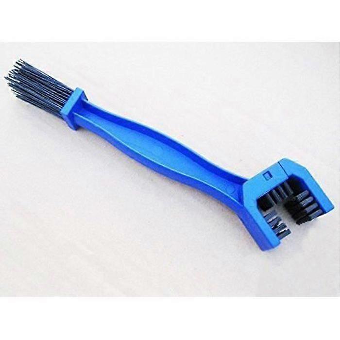 Brush for cleaning the motorcycle chain