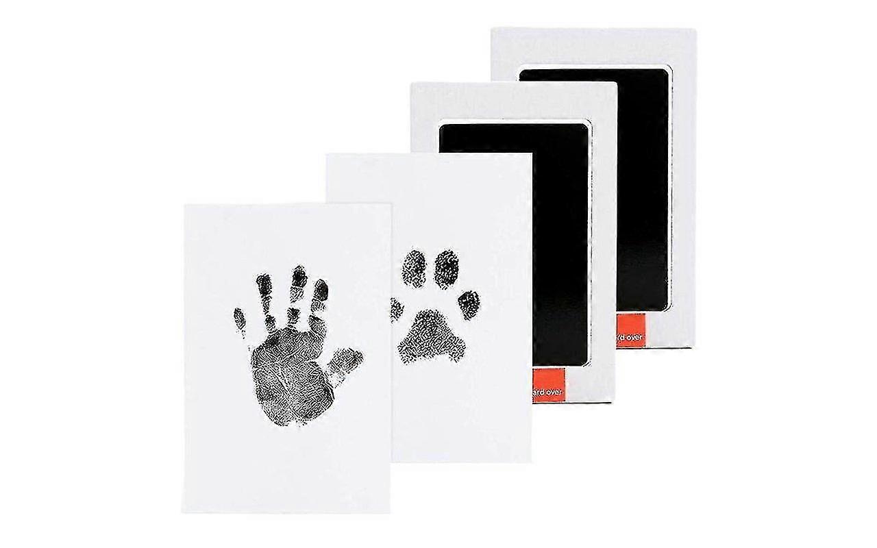 Vauvan jalanjälki ja kädenjälki Musteeton mustetyyny piirustus ja maalaussarjat